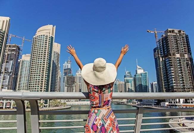 5<em> Private Dubai City Tour Half Day with 4X4 Luxury Car – Key points to know before booking’ /></p>
<ul>
<li><strong>Private 4×4 for up to six:</strong> The $299 group price works best when shared by a full group.</li>
<li><strong>A broad Dubai sampler:</strong> You cover Jumeirah, Palm Jumeirah, Dubai Marina, Deira, Al Seef, Zabeel, Downtown Dubai, and the canal.</li>
<li><strong>Most admissions are free:</strong> The tour does not include entry to Burj Khalifa, which costs about 170 to 180 AED.</li>
<li><strong>Old Dubai is included:</strong> The Gold Souk, Spice Souk, and Al Seef add local character to an otherwise modern route.</li>
<li><strong>Four hours moves quickly:</strong> Expect several brief stops, with longer time at selected markets and landmarks.</li>
<li><strong>Driver quality matters:</strong> Past feedback praises the clean car, polite service, organization, and prompt replies, but one account raised concerns about a guide’s limited local knowledge.</li>
</ul>
<h2>A private way to get your Dubai bearings</h2>
<p><img width="669" height="446" decoding="async" src=