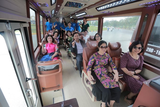 A Comfortable Trang An - Bai Dinh Limousine small group tour 1 day - Taking the Trang An boat into the caves