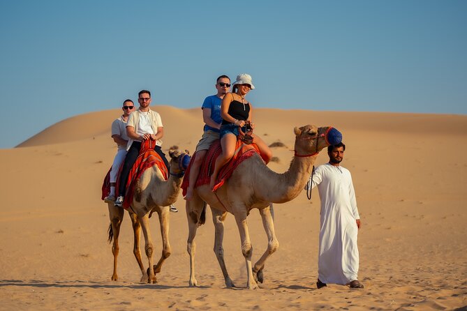 Abu Dhabi Evening Desert Safari - Private car Dune bashing & BBQ - Leaving Abu Dhabi for the open dunes