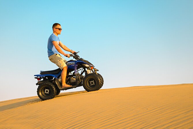 Abu Dhabi Evening Desert Safari - Private car Dune bashing & BBQ - Sand boarding, camel farm, and sunset photography