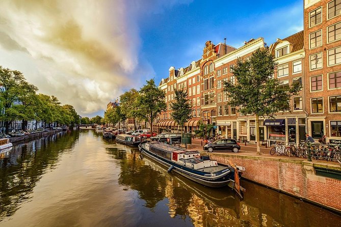Airport Transfer: Schiphol Airport AMS to Amsterdam by Luxury Van - What the 25-minute ride gives you