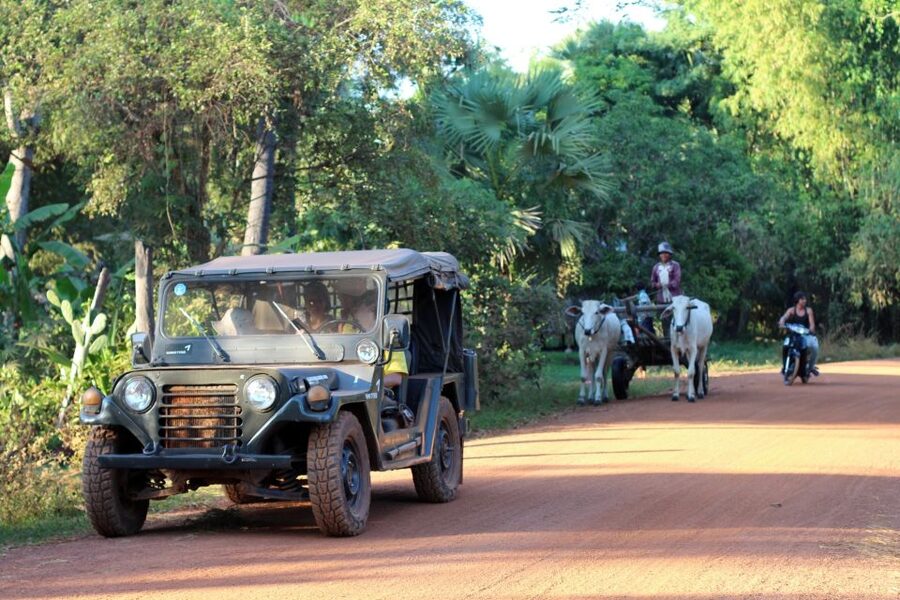 Angkor Wat in a vintage Jeep with driver - jeep rental - Ta Prohm and the famous tree-covered ruins