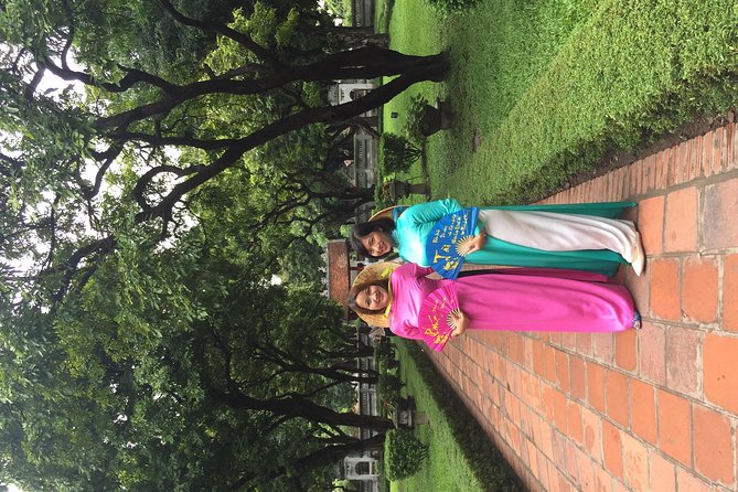 Ao dai Vietnam photograph tour with private car - The red bridge at Cau The Huc