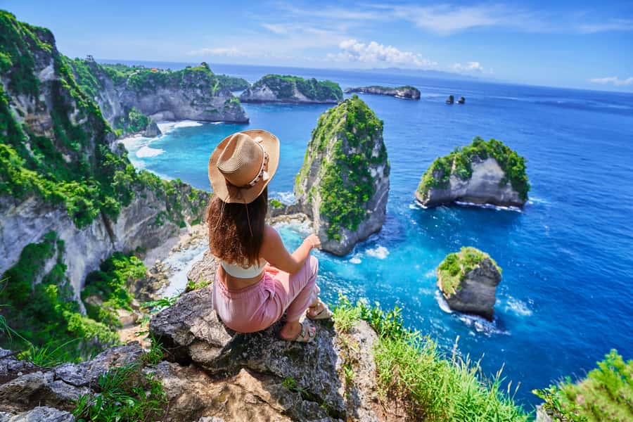 Bali: Private Car with Driver in Nusa Penida - The beach stop: swimming, rock formations, and photographs