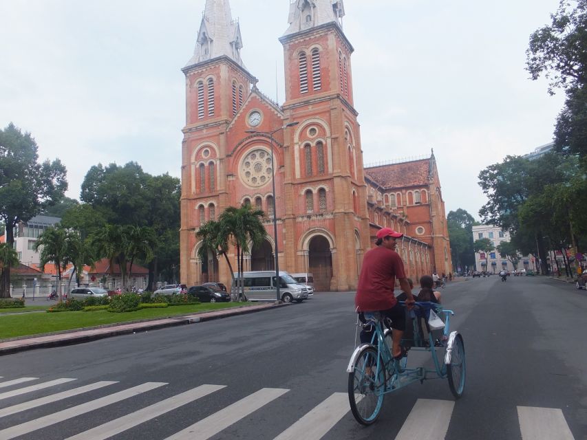 Customized Ho Chi Minh City Experience on Cyclo with Driver - Street vendors, family businesses, and an old pagoda