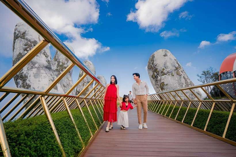Da Nang: Ba Na Hills and Golden Bridge Limousine Tour - First cable car stop: Golden Bridge, gardens, and pagoda