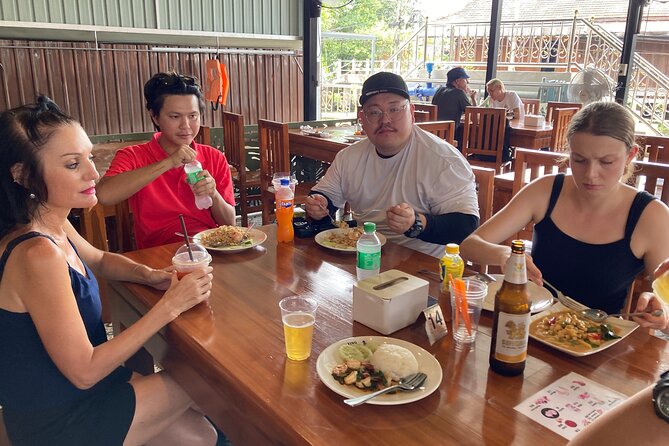 Damnoen Saduak and Maeklong Railway Market Tour with Private Car - Maeklong Railway Market and the train through the stalls