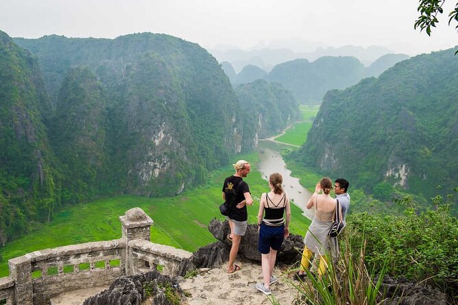Deluxe & Small Group Hoa Lu Tam Coc Mua Cave Full Day Tour - Limousine Transfer - The guide can make the historical stop work
