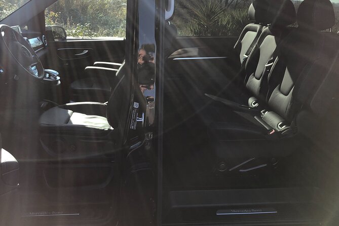 Fiumicino Airport private transfers with luxury Mercedes van - Driver service and the small personal touches