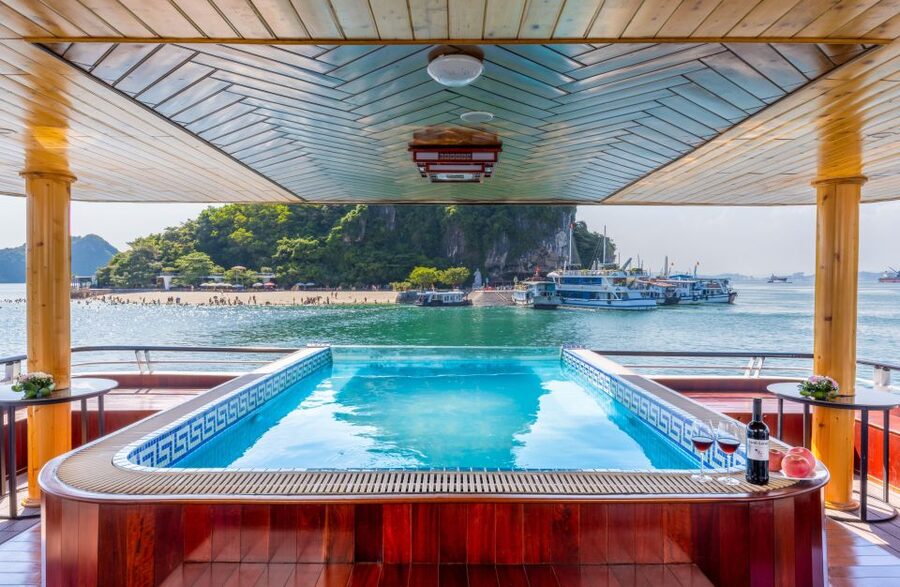 From Hanoi: 1-Day Halong 5-Star Cruise w/Jacuzzi & Limousine - Titop Island for views, swimming, or a Jacuzzi break