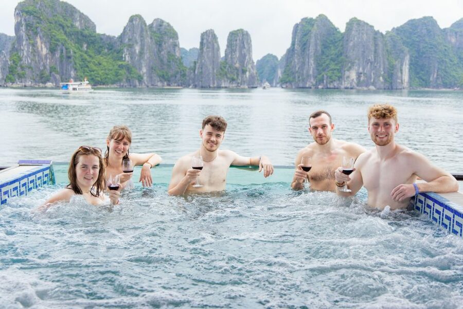 From Hanoi: 1-Day Halong 5-Star Cruise w/Jacuzzi & Limousine - Sunset snacks on the way back to port