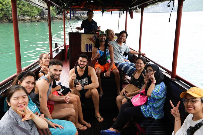 From Hanoi: 2D1N Ha Long Bay Deluxe Cruise with Bus Limousine - Kayaking, pearl farming, and the schedule that may vary
