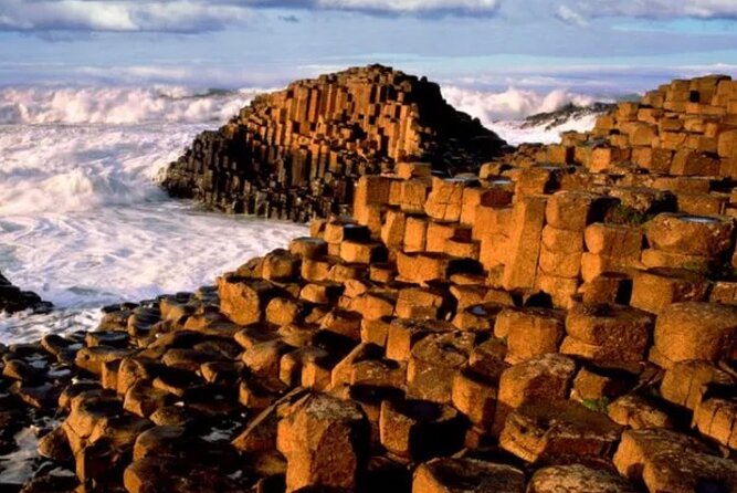 Giants Causeway with Private Chauffeur Day Tour from Dublin - Dunluce Castle above the Atlantic