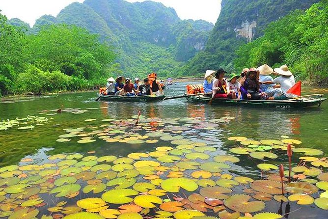 Hanoi - Hoa Lu - Tam Coc - Mua Cave - 1 Day / By Luxury Limousine & Small Group - Leaving Hanoi in a 17-seat limousine