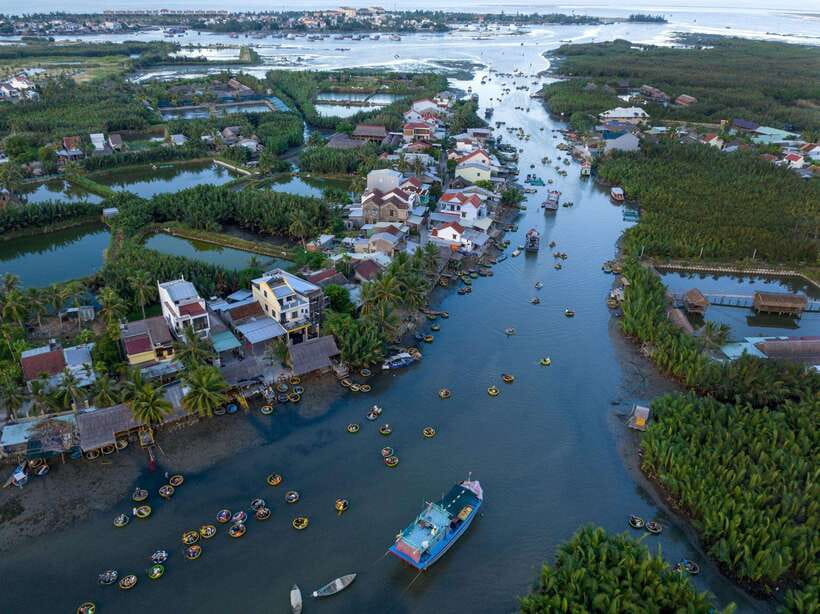 Hao Coconut: Hoi An Basket Boat Tour W 2-Ways by Private Car - Getting into the round bamboo basket boat