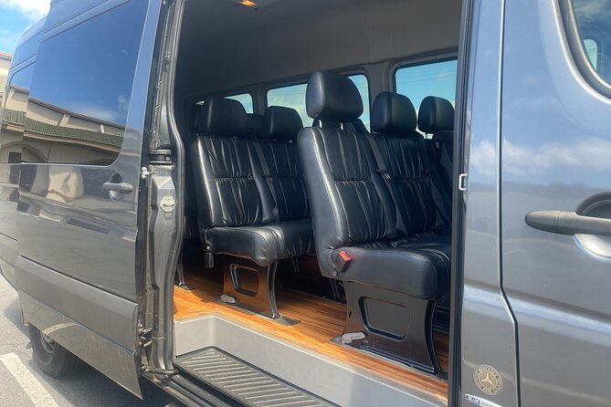 HNL Airport & Waikiki Private Transfer by Brand New Mercedes Van - The optional orchid lei greeting