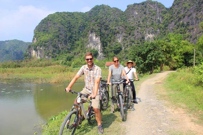 Hoa Lu - Tam Coc Luxury Small group 1D: Limousine bus, biking, boat trip, Lunch - What the guide adds