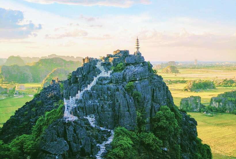 Hoa Lu, Tam Coc, & Mua Cave Day Trip with Lunch & Limousine - A short bicycle ride through the countryside