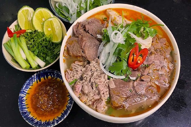 Hue Food Tour by Walking or Cyclo or Motorbike with Driver - Eating around the Citadel district