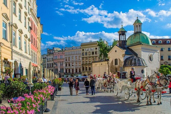 Krakow & Auschwitz day tour from Warsaw by private car with Lunch - Krakow’s Main Market Square in 30 minutes