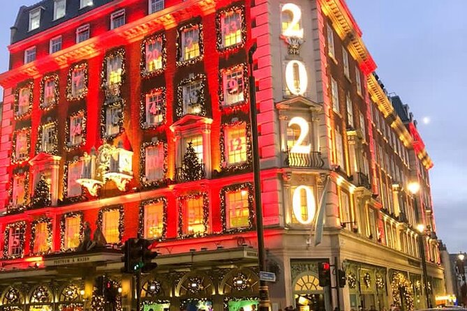 London Christmas Lights Private Car Tour with Driver Guide - Oxford Street: big displays and busy sidewalks