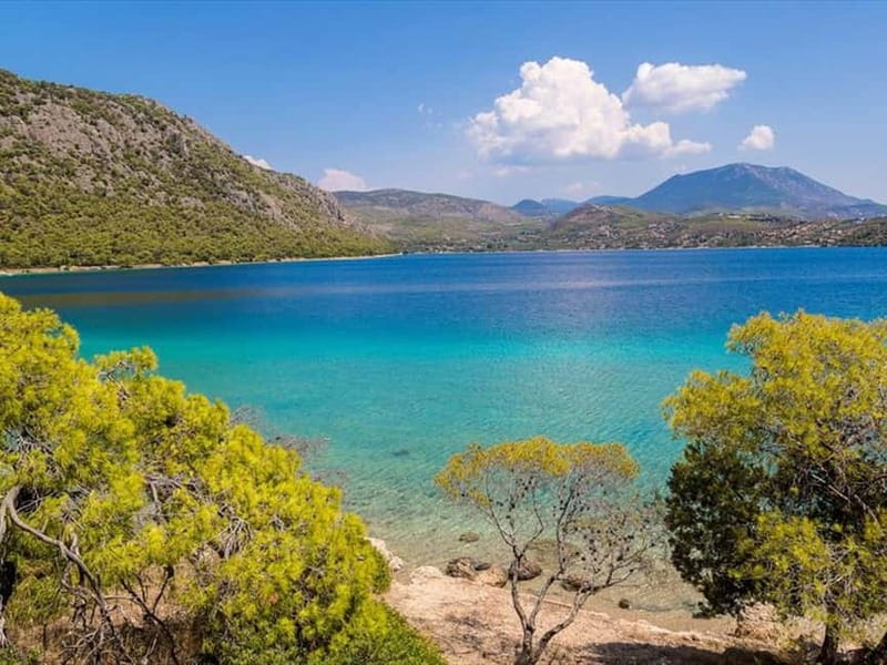 Loutraki & Lake Vouliagmeni: Half Day Experience with Driver - Melagkavi Cape and its working-looking landmark