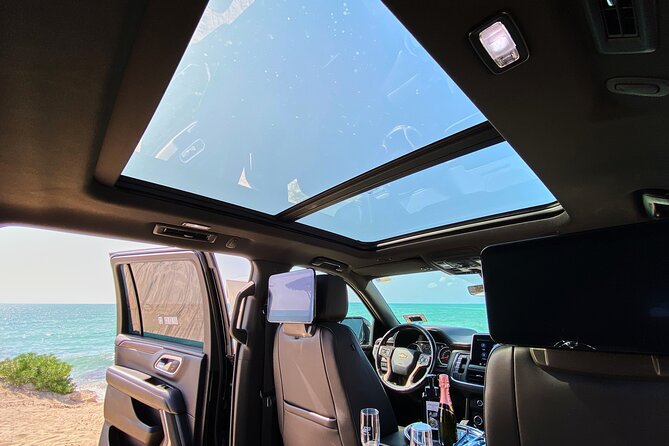 Luxury Suv departures from Tulum to Cancun Airport - The pickup at your Tulum hotel