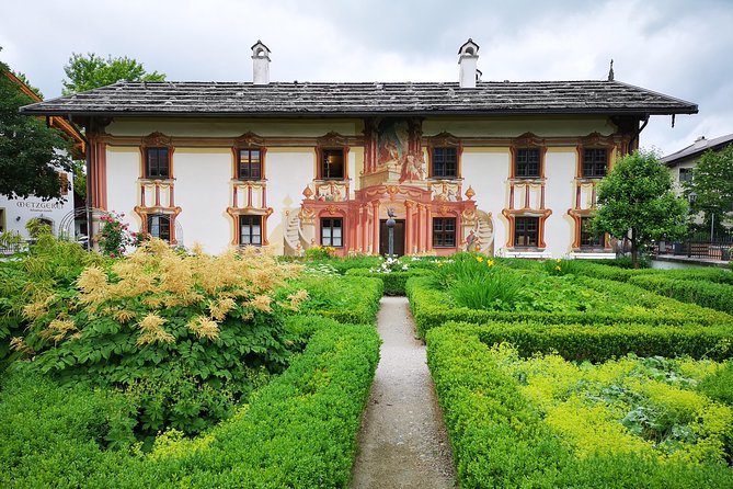 Munich private Car & Walking Tour incl. BMW World & River Surfers - The Alps, Zugspitze, and extra mountain costs