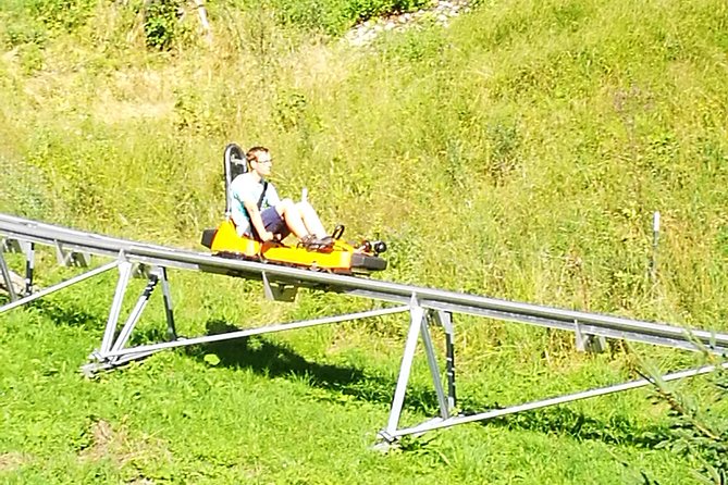 Munich private Car & Walking Tour incl. BMW World & River Surfers - Oberammergau and the Bavarian village side of the trip
