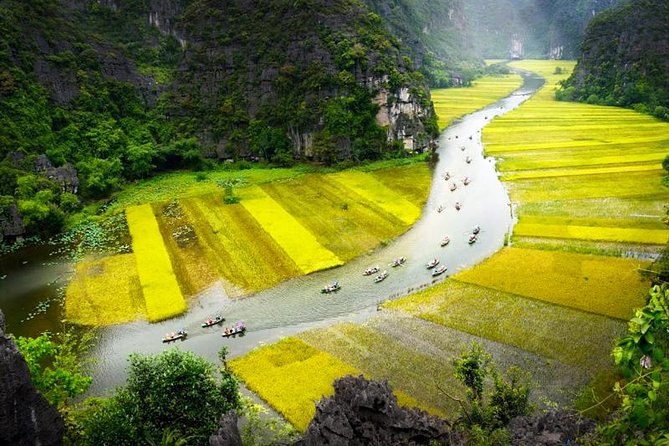 Ninh Binh Tour Hoa Lu Tam Coc Full Day: Biking,Boating,Tickets,Lunch, Limousine - Tam Coc by boat: three caves and limestone cliffs