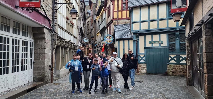 Paris to Mont Saint-Michel Day Trip in luxury van Live Guide - Walking through the village and main street