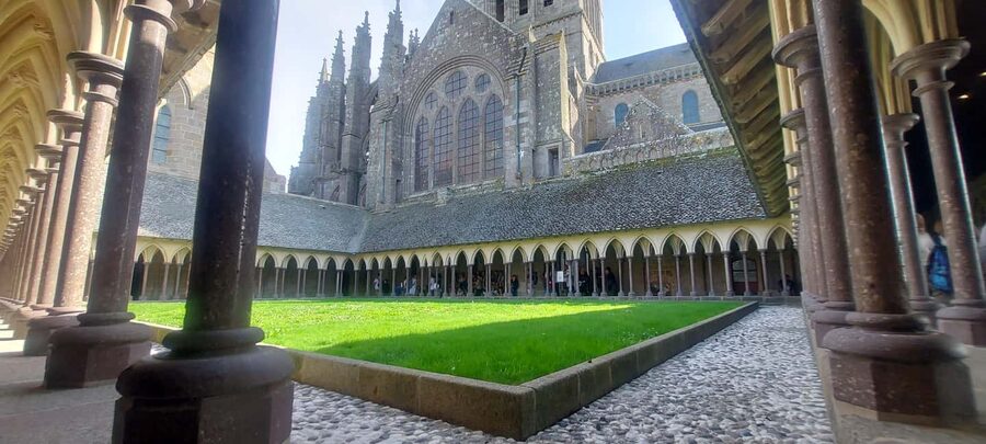 Paris to Mont Saint-Michel Day Trip in luxury van Live Guide - Walking the ramparts for views across the bay