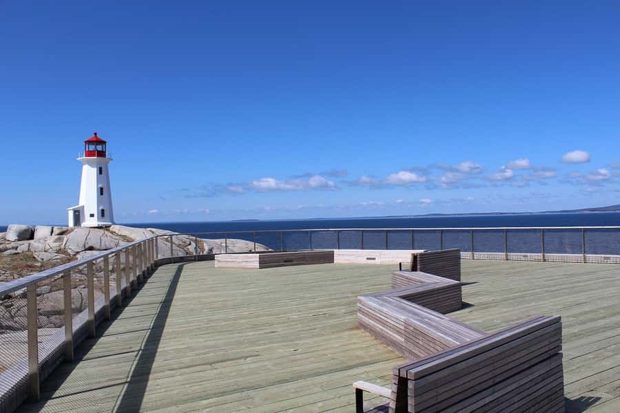 Peggy’s Cove Private Car Tour – 3.5 Hours - Peggy’s Point Lighthouse and the granite shore