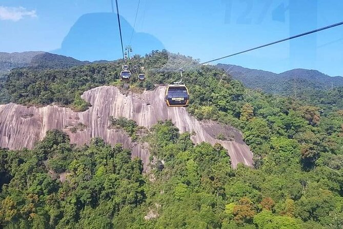 Private Car to Visit Golden Bridge - Ba Na Hills with Cable Car Ticket Included - Crossing the Golden Bridge between giant hands