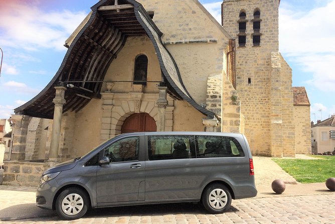 Private Paris Airport Layover with English speaking Chauffeur - Cruising Along the Champs-Élysées