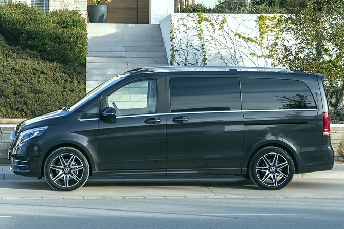 Private Transfer: Madrid Airport MAD to Madrid in Luxury Van - Finding your driver at Madrid-Barajas