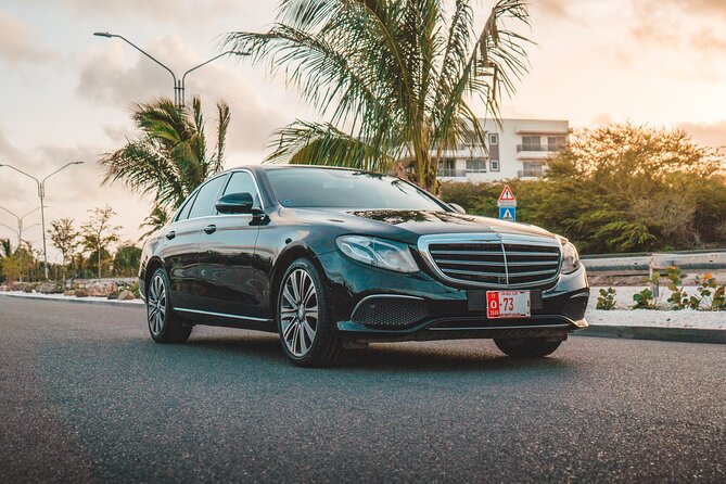 VIP Luxury Sedan Airport Transfer - Arriving at Reina Beatrix International Airport